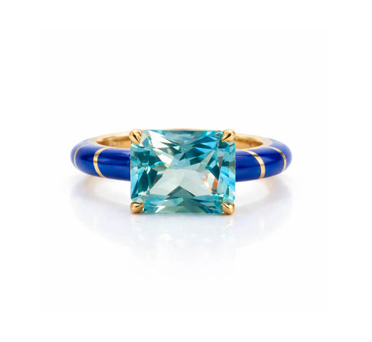 fine jewelry ring with a Blue Topaz set in 18 karat yellow gold wrapped in Blue Ceramic
