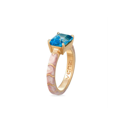 EMERALD CUT BLUE TOPAZ SET IN 18K GOLD