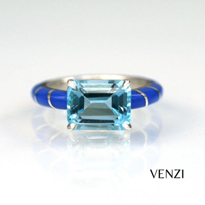 EMERALD CUT BLUE TOPAZ SET IN 18K GOLD