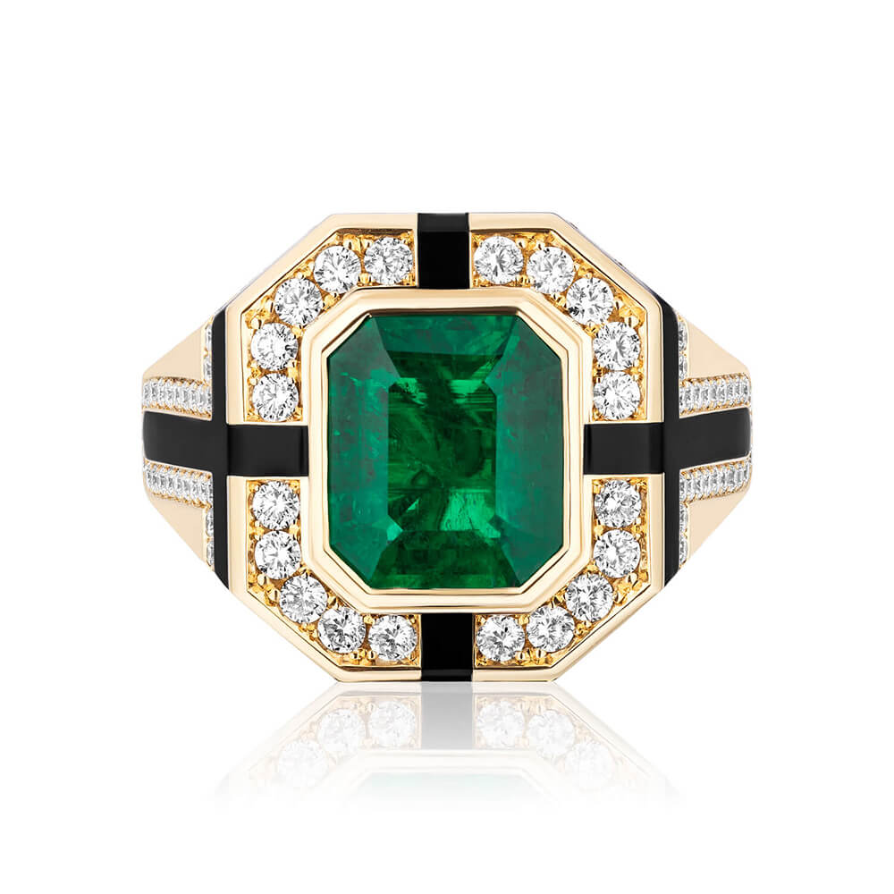 colombian emerald from the muzo region and diamonds set in 18 carat yellow gold and black ceramic